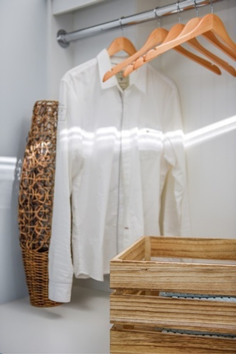 White Shirt on Hanger - Laundry Renovation Services Aurora by Royal Interior Design Ltd